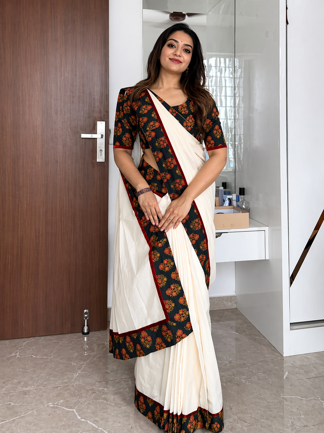 Off White Linen Saree with Black Floral Printed Blouse & Border