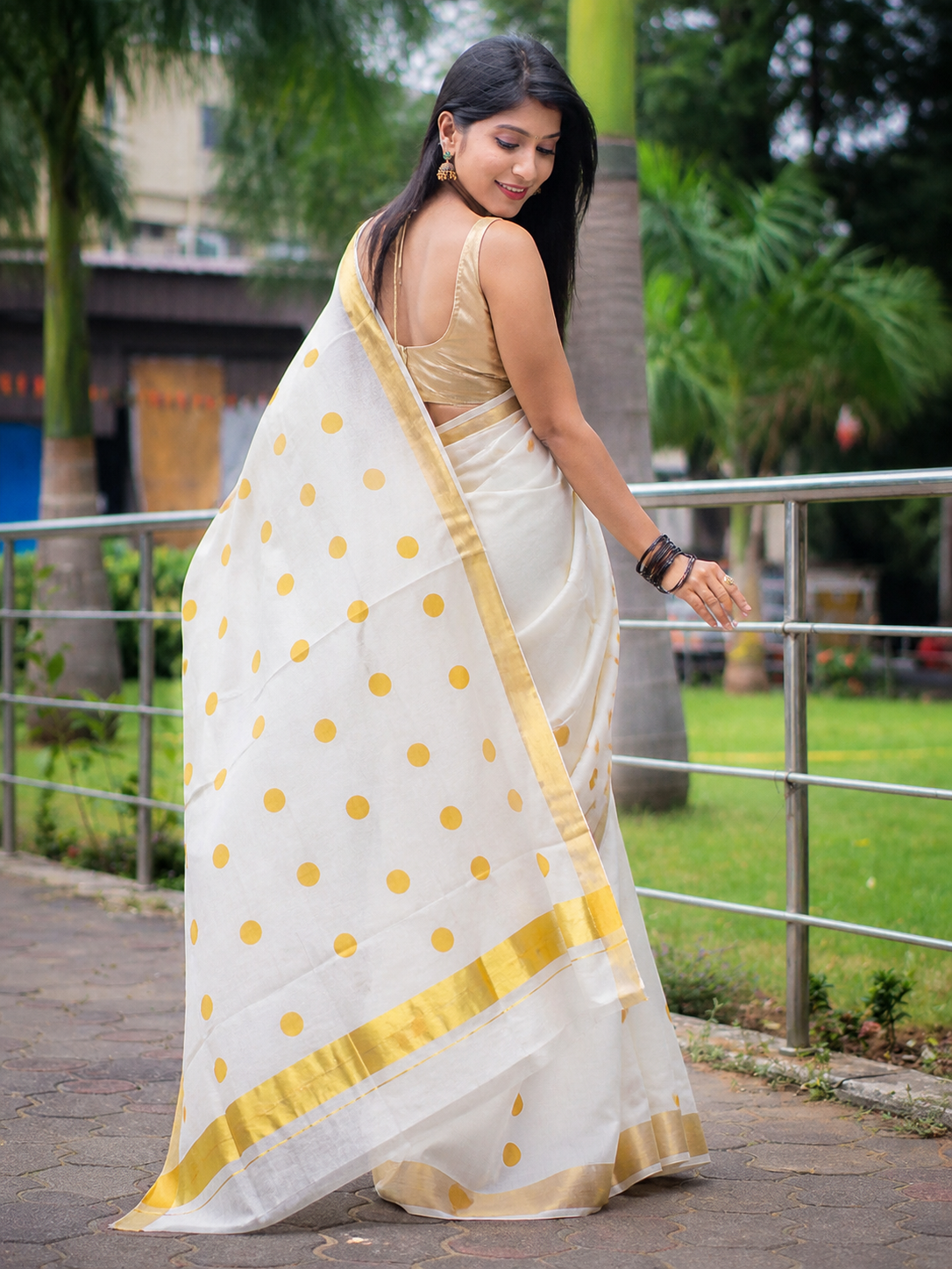 Elegant White Polka Dot Linen Saree with Golden Border